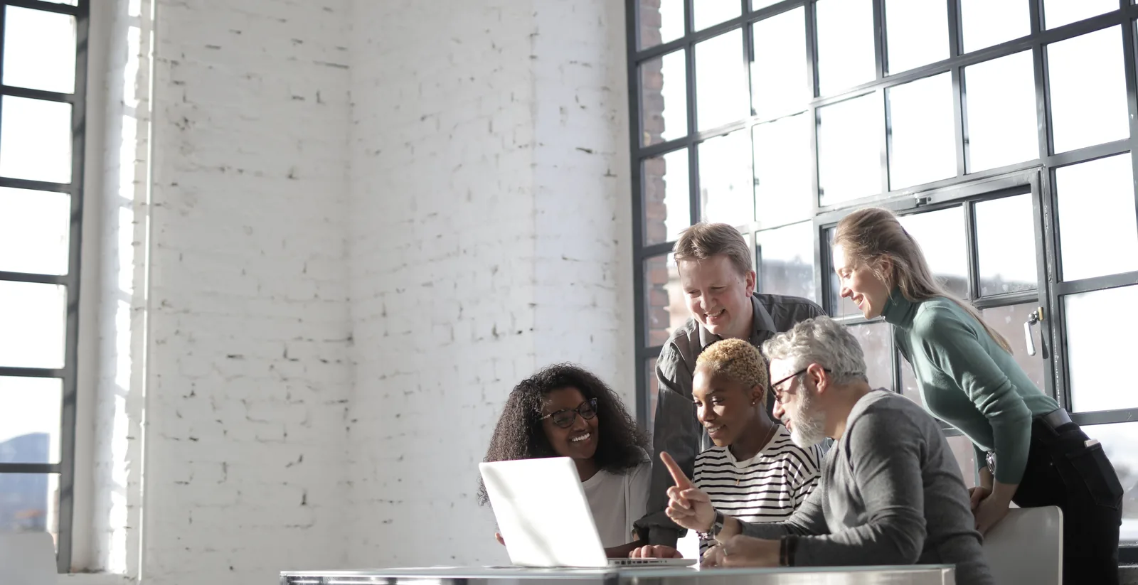 Professional team collaborating in a bright office